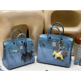 30cm Birkin (Trianon Canvas & Leather) – Color: Blue Jean – Known as a limited-edition model, this stylish design combines denim and leather to express both a vintage feel and modernity at the same time.