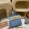 Hermès Birkin 25 (Trianon Canvas & Leather) – Color: Blue Jean (with Silver Hardware) – This limited-edition model is an extremely rare piece even among Hermès collections. Its classic yet stylish design stands out, and it features a retro-modern atmosphe