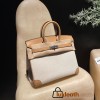 Hermès Birkin 25 (Triomphe H Canvas & Swift Leather) – Color: 4B/Biscuit (with Silver Hardware) – A warm biscuit tone – A perfect combination of lightweight canvas and glossy Swift leather. The calm biscuit tone creates an elegant and easy-to-use atmosphe