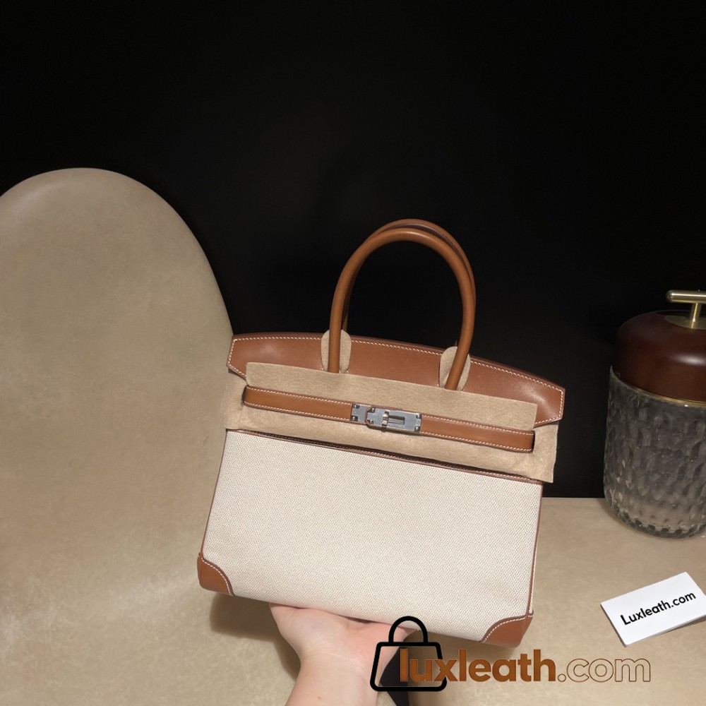Hermès Birkin 30 (Canvas & Barenia Leather) – Color: 37/Gold with Gold Hardware – The youthfulness brought by the canvas and the luxury of Barenia leather blend beautifully – a rare specification that is lighter and easier to use than full-leather models.
