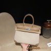 Hermès Birkin 30 (Canvas & Swift Leather) – Color: 0M/Chai with Gold Hardware The casualness of the canvas and the soft texture of Swift leather are charming – lighter and easier to use than full-leather models, fitting for a youthful style.