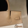 Hermès Birkin 30 (Canvas & Swift Leather) – Color: 0M/Chai with Gold Hardware The casualness of the canvas and the soft texture of Swift leather are charming – lighter and easier to use than full-leather models, fitting for a youthful style.
